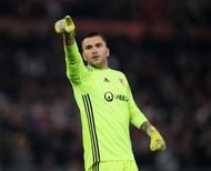 ROME, ITALY - MARCH 16: Olympique Lyonnais goalkeeper Anthony Lopes reacts after the opening goal scored by Mouctar Diakhaby during the UEFA Europa League Round of 16 second leg match between AS Roma and Olympique Lyonnais at Stadio Olimpico on March 16, 2017 in Rome, Italy.  (Photo by Paolo Bruno/Getty Images )